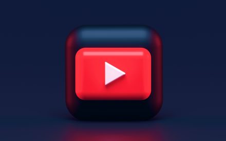 red play button with dark background