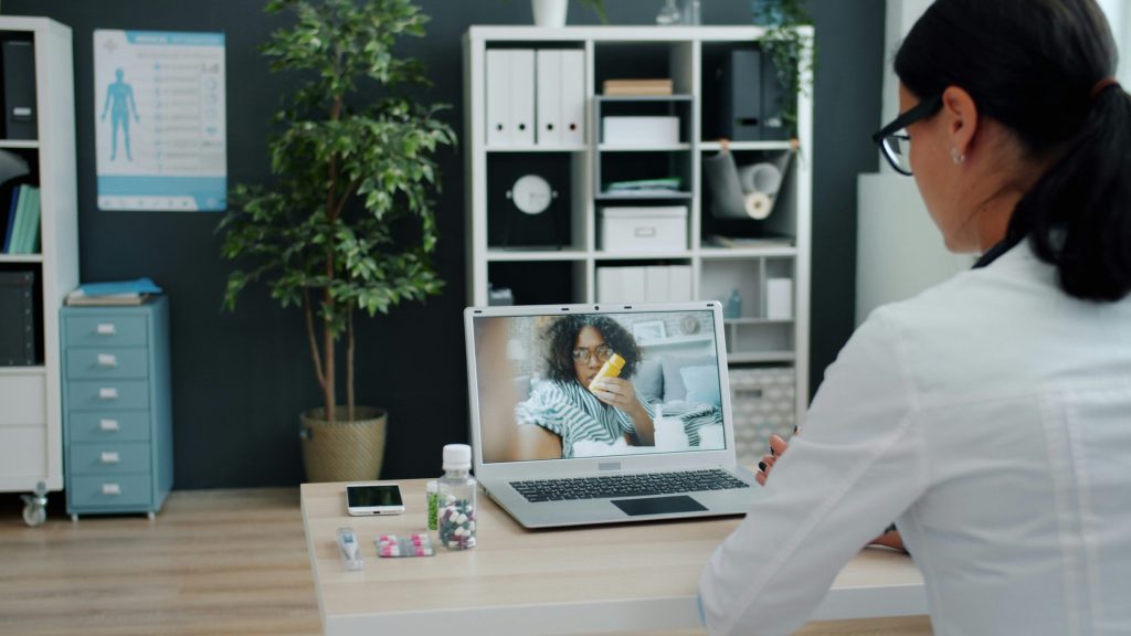 Healthcare professional in tele-health meeting