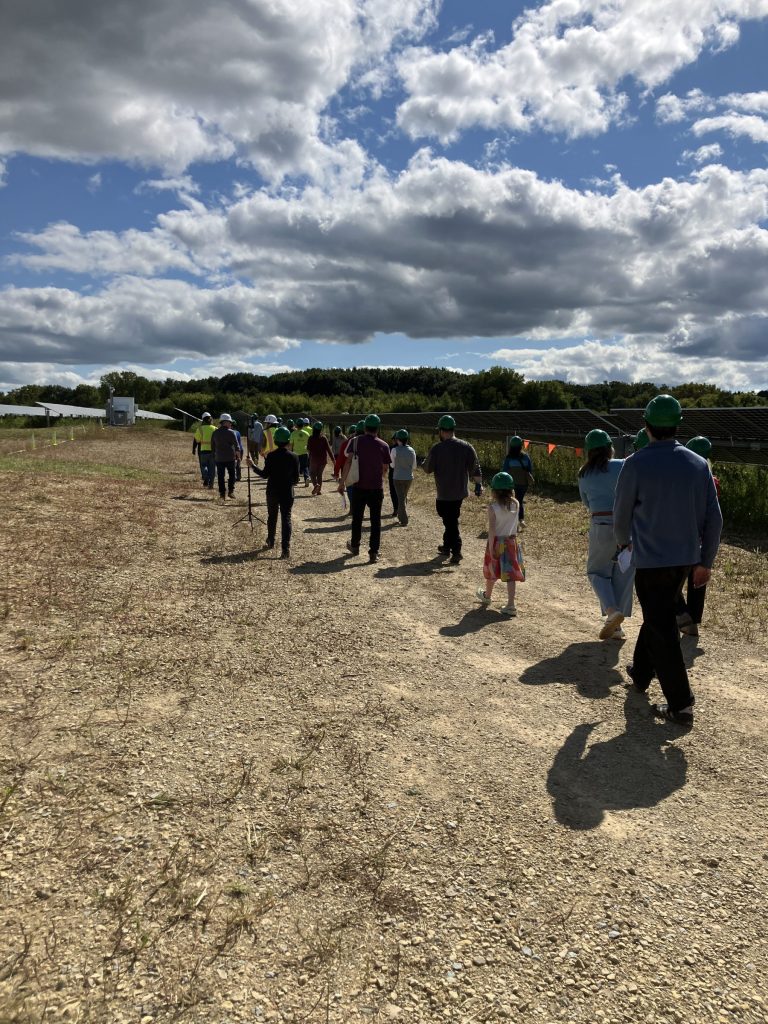 Group touring solar facility